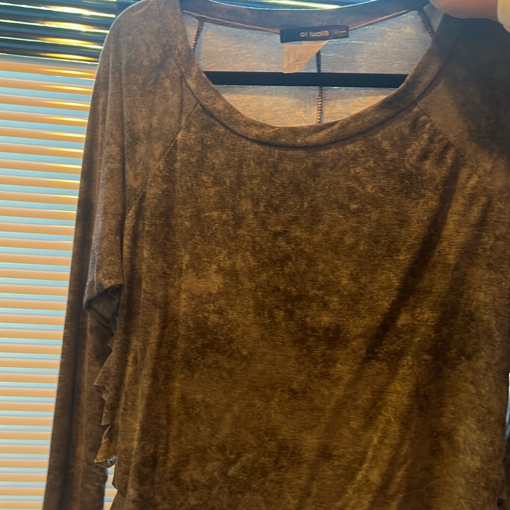 Grey long sleeve with shredded sides